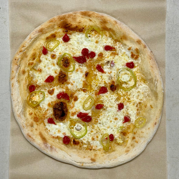 Juneau Natural Dolce Inferno pizza, baked